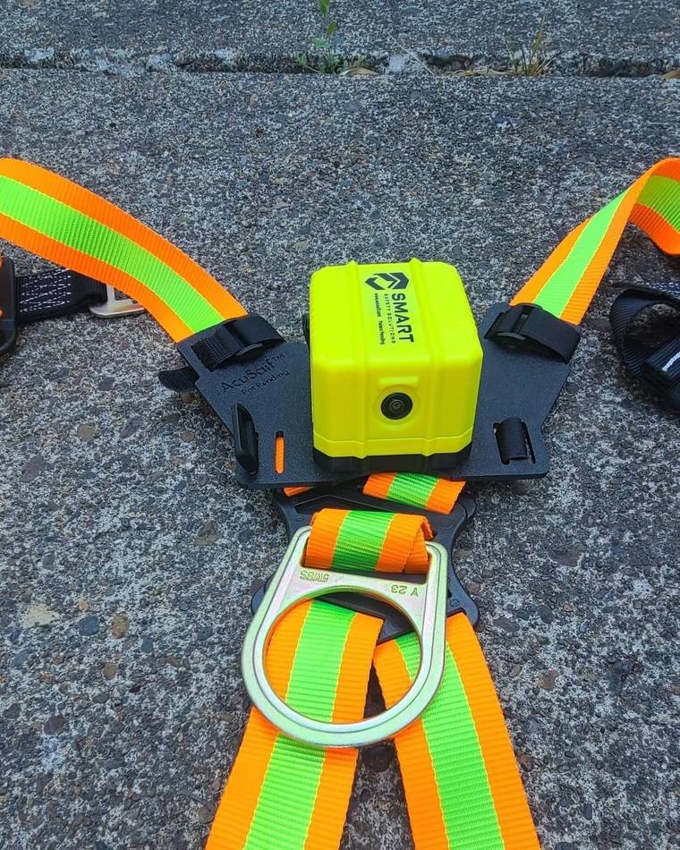 Finished install: camera centered above the D-ring with the lens facing down